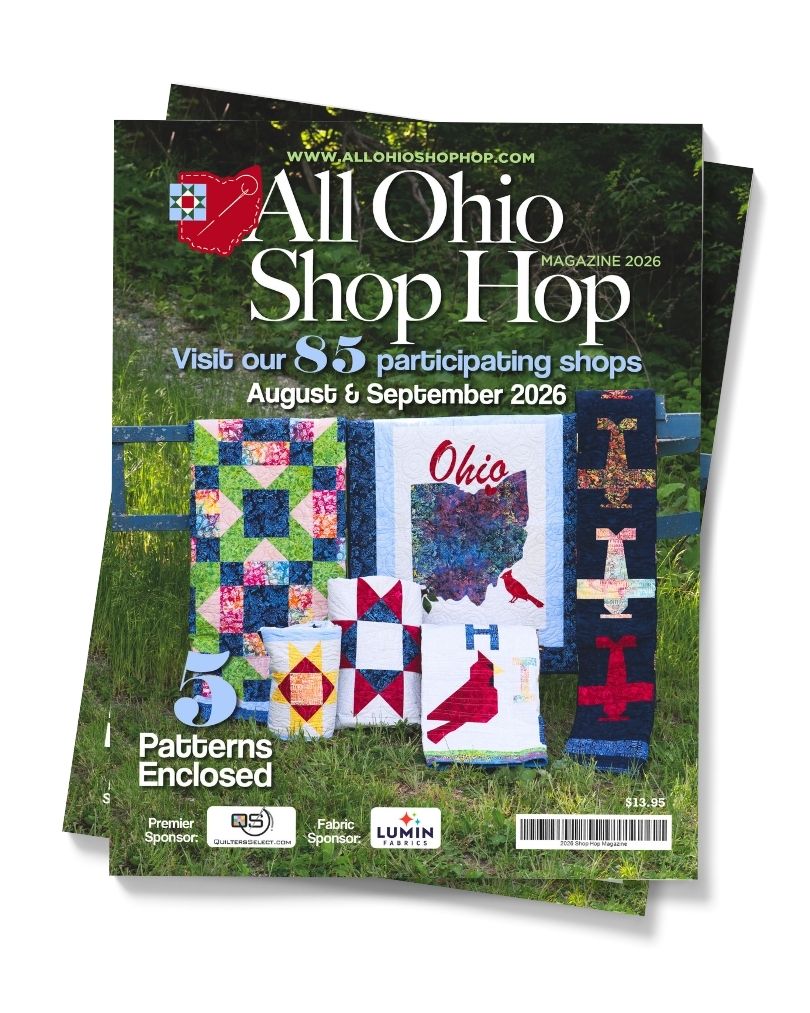 Magazine cover for 'All Ohio Shop Hop' with quilt designs on a grassy background