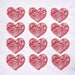 Red heart-shaped designs with intricate patterns on a white background