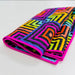 Colorful patterned towel on a white background