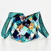 Multicolored patchwork bag with a strap on a white background