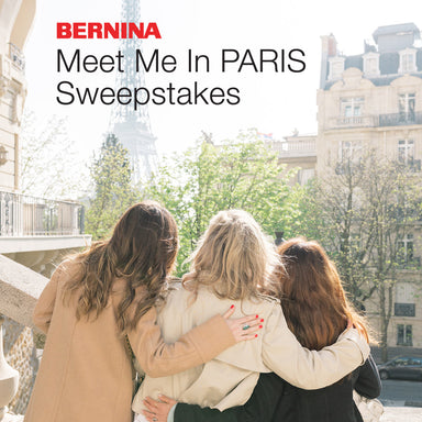Three women hugging in a Parisian street with the Eiffel Tower in the background, promoting the BERNINA Meet Me in Paris Sweepstakes.