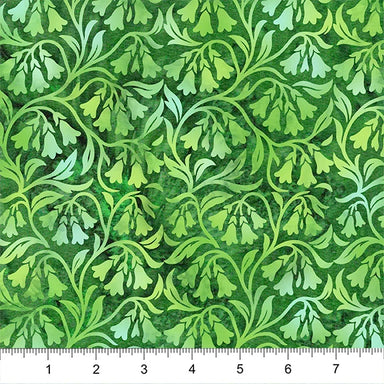 Green leafy pattern fabric with a ruler at the bottom