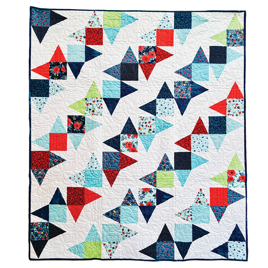 Colorful quilt with geometric pattern on a white background